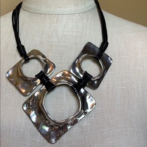 Silver Statement Necklace with Leather Accents